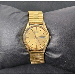 Seiko SQ Watch Men Gold Tone Daydate  6923-7009 Needs Battery English/Spanish